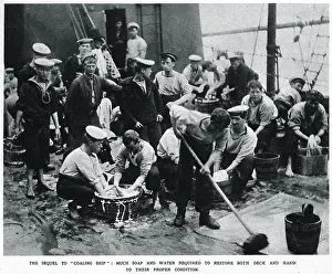Swab: Sailors swab the decks after refuelling their ship