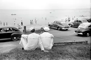 Rear View: Sailors - World War II - men - beach