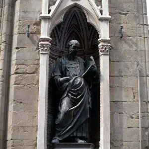 Evangelist: Saint John the Evangelist. Statue