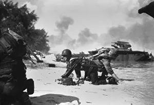 Forager: On Saipan, invading Marines under Japanese fire
