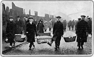 Silvertown: Salvaging bedding after blast at Munitions works, Silvertown