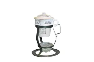 Feeder: Sam Clarke's Pyramid Food Warmer and stand