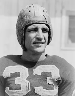 Baugh: Sammy Baugh (1914-2008), wearing a tattered ?