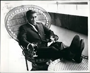 Commence: Sammy Davis Jr, American singer and dancer, arrives in Londo