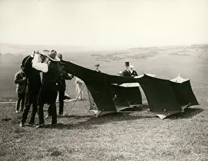 Downs: Samuel Cody adjusts his kite