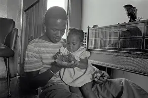 Sandile: Sandile Qwabe and daughter