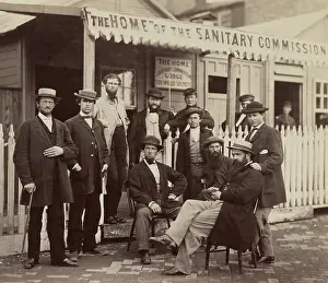 Templeton: Sanitary Commission workers at the entrance
