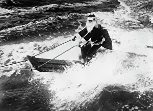 Surfer: Santa Claus on a surfboard