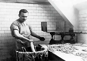 Distributed: Sausage production, 1916