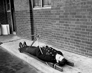 Scaling: A scaling ladder rescue drill demonstration, WW2