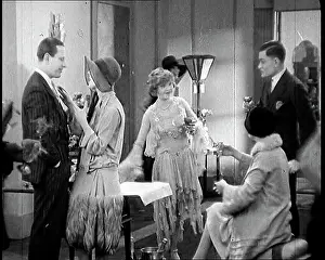Cocktail: Scene from a 1920s Film. A Group of Actors