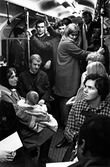 Scene in a crowded London Underground train