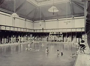 Swimmers: Scene in an indoor swimming pool