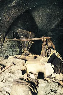 Grindstone: Scene inside a mill, Holy Land