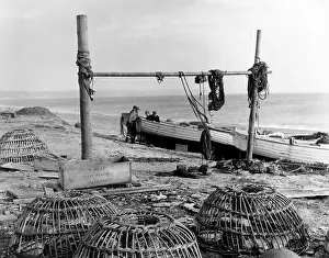 Torcross: Scene with lobster pots at Beesands, Start Bay, Devon