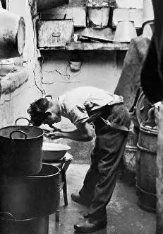 Slum: Scene in a London slum, 1935