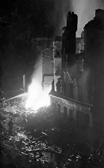 Precarious: Scene in Poplar High Street during the Blitz, WW2