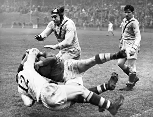 Grapple: Scene at a rugby match