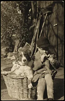 C1930: SCHOOL BOY WITH HIS DOG