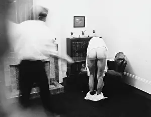 Schoolboy being caned