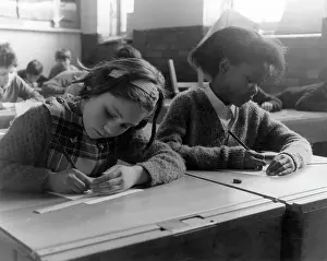 Schoolgirls: TWO SCHOOLGIRLS IN CLASS