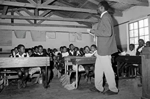 Schoolteachers: Schoolteacher and class in a rural school in Braklaagte