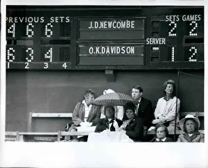 Scoreboard: Scoreboard and spectators at Wimbledon tennis