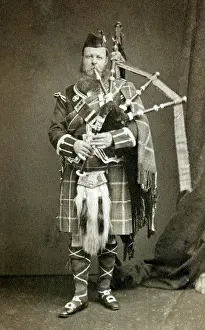 Pipes: Scotsman playing the Bagpipes