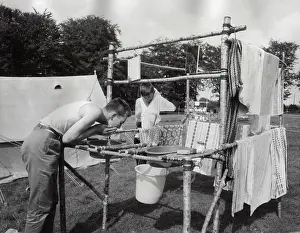 Buckets: Scout washing on camp