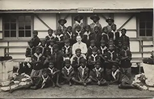 Scoutmaster: Scouts and cubs from Ghana with their leader