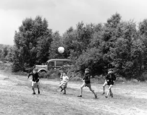 SCOUTS PLAYING FOOTBALL