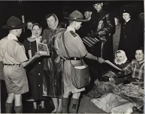 Overnight: Scouts selling Coronation programmes