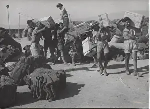Crates: Scouts unloading supplies after earthquake, Greece