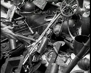 Thrown: Scrap Metal Being Thrown into a Pile