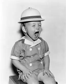 Brat: Screaming boy in pith helmet