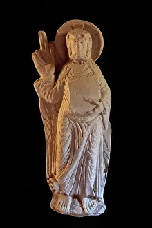 Cabestany: Sculpted figure of Christ holding a book and making