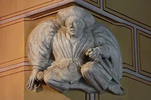 Moneybag: Sculpted figure, Palais Jacques Coeur, Bourges, France