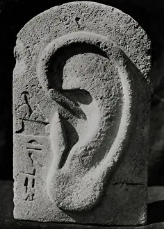 Selim: Sculpture of huge ear with hieroglyphics