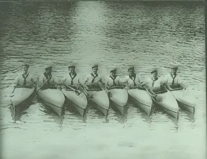 Kayak: Eight Sea Scouts in their canoes