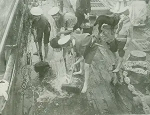Swabbing: Sea Scouts washing the deck