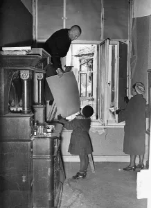 Cardboard: Sealing a window with cardboard, 1943
