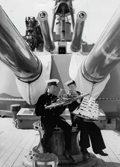 Ramillies: Two seamen with model boats on the