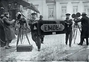 Signboard: Two seamen with the signboard of the cruiser