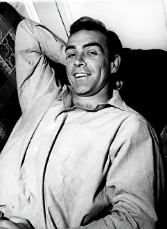 Portray: Sean Connery, Scottish actor, smiling