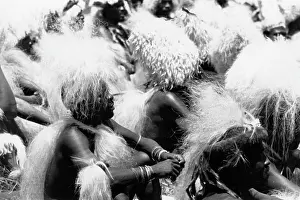 Exuberantly: Seated Zulu Men