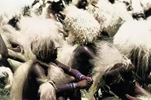 Exuberantly: Seated Zulu Men
