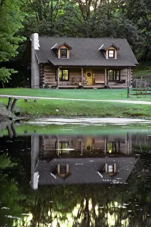 Domicile: Secluded Log Cabin Home Located by and Reflected