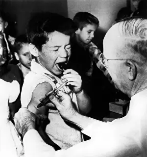Grader: Second Grader gets his Vaccination from ?