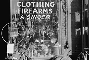 Omaha: Secondhand goods. Note surgical instruments in window, Omaha