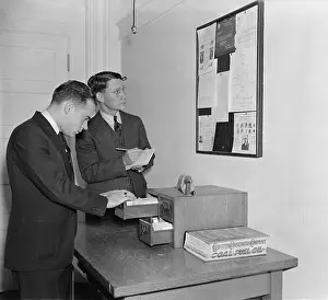 Diligent: Secret Service agents checking over bulletin ?